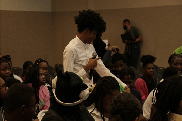 2024 Youth Mental Health Summit audience member talking