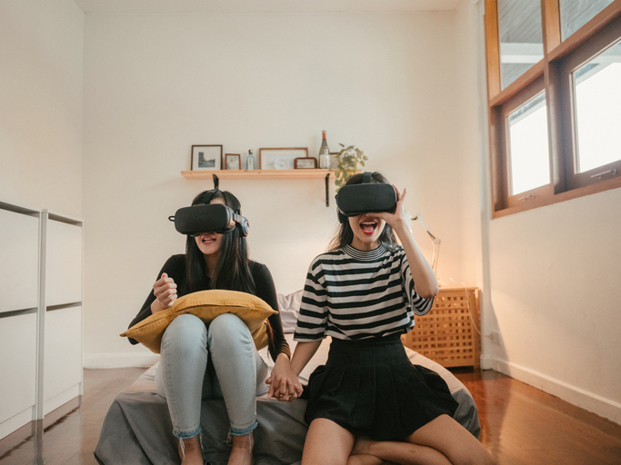 teen girls playing video games