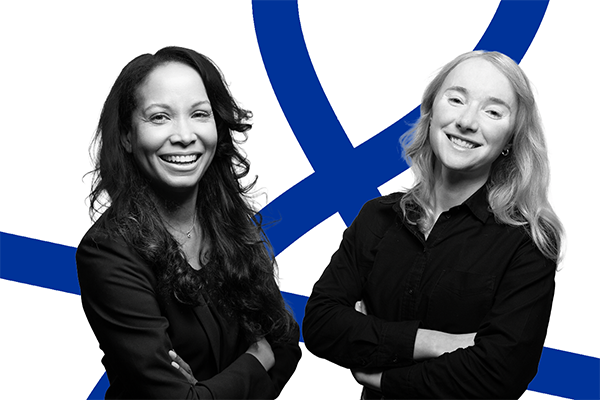 Two professionals smiling with arms crossed against a graphic blue abstract background