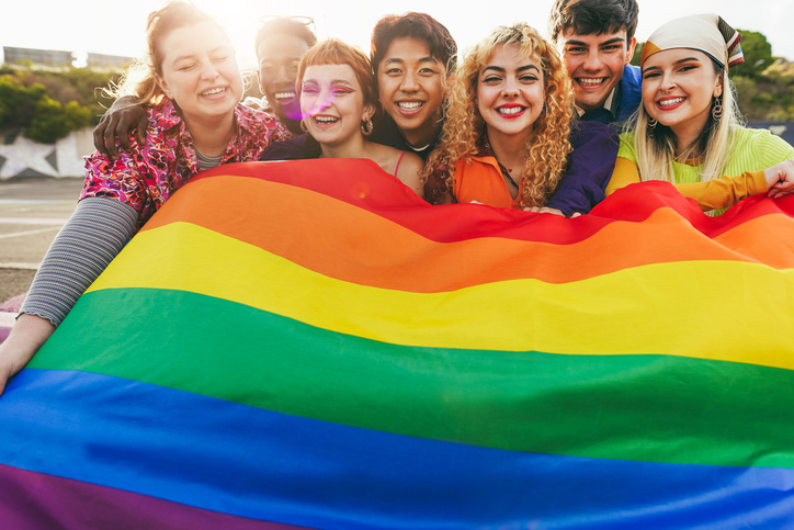 Group of youth with pride flag