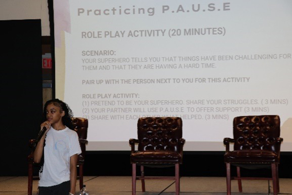 Child giving presentation at 2023 Youth Mental Health Summit