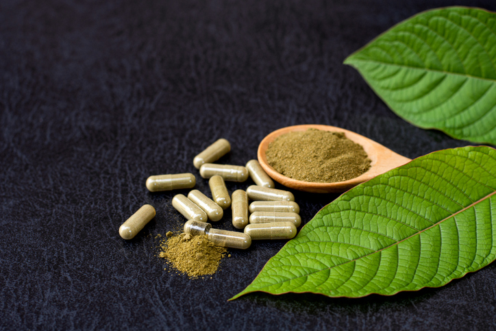 kratom leaves and pills and powder