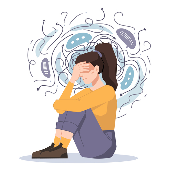 Anxious woman with head in hand
