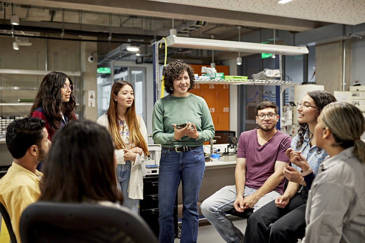 group of young adults talking