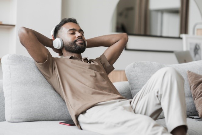 man listenting to music on headphones