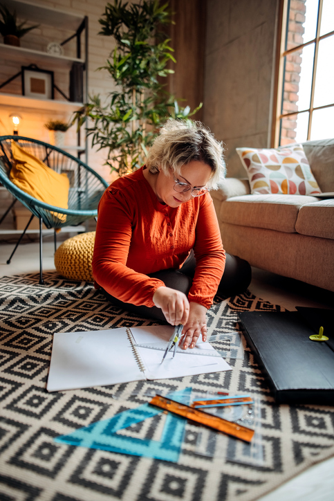 older woman engaging in art at home