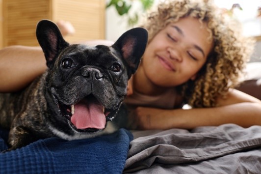 smiling teen girl and her dog