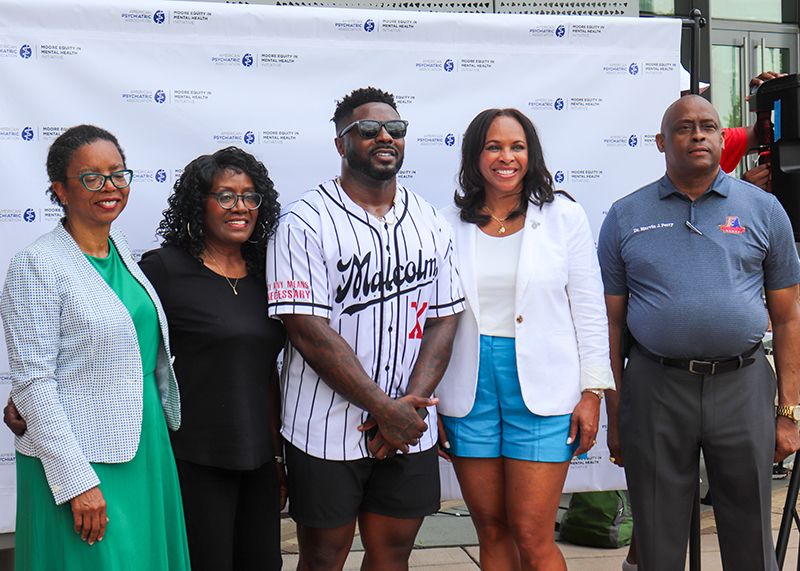 participants pose for a photo at the 2023 Moore Equity in Mental Health Community Fair