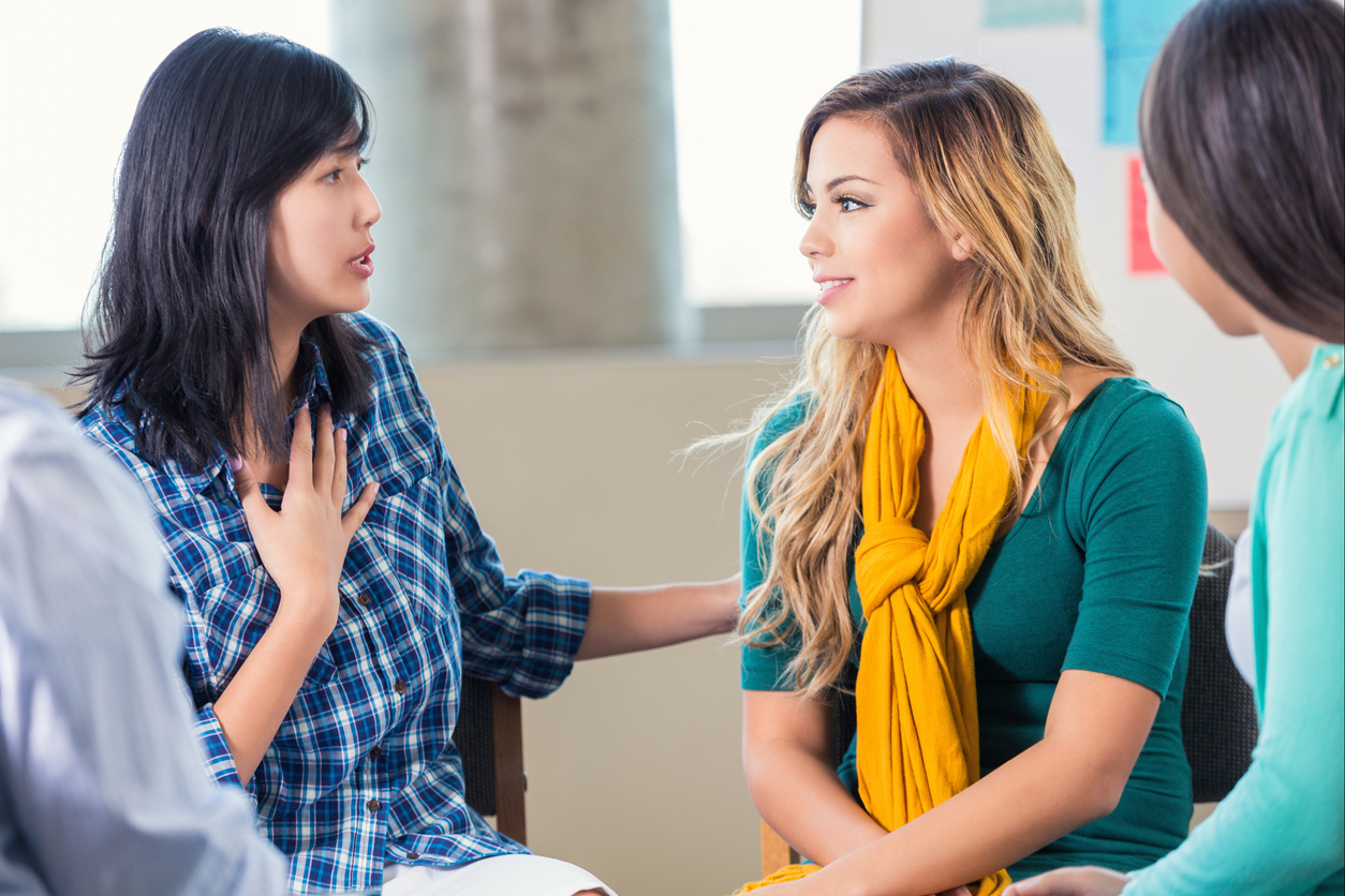 school counselor with teen student