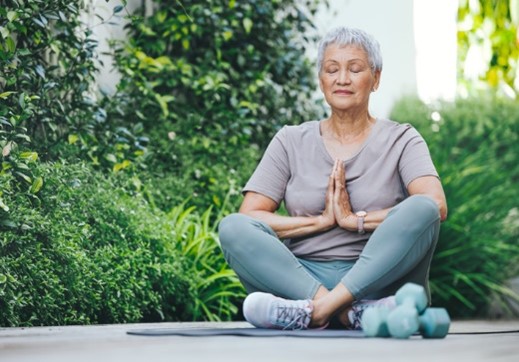 Asian woman in yoga pose