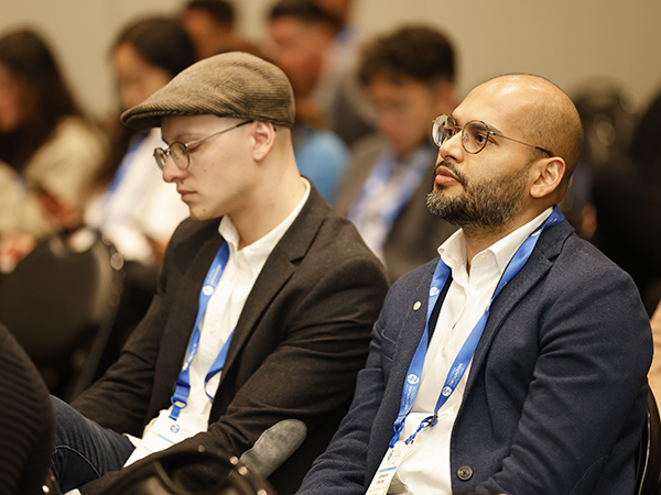Attendees listening to session speaker